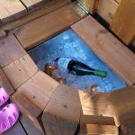 A drink and food cooler out of wood