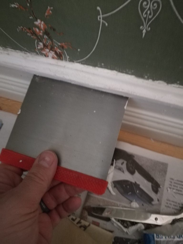 Leveling profile with the scraper